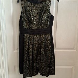 Black and gold pleated dress